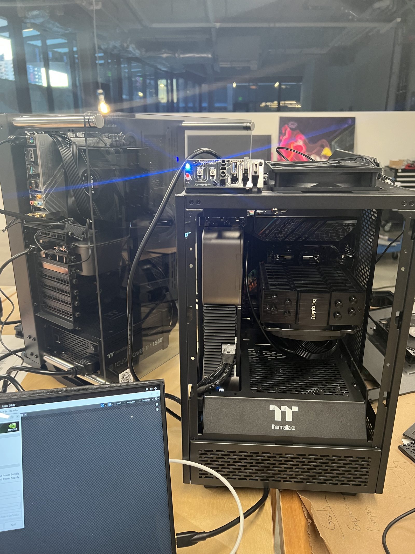 The interior of one PC build — GPU, motherboard, cooling stack visible